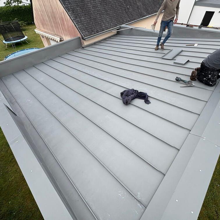 Pose éléments en zinc